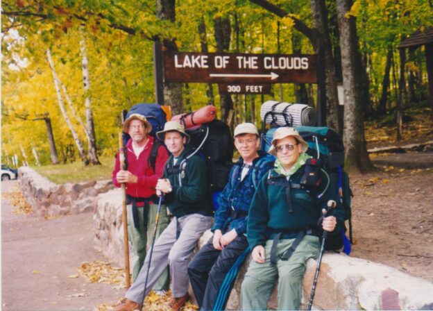 Four guys with backpacks